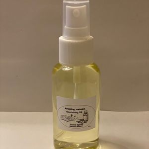 Nourishing Oil Shine Spray by Anointing Metuaka